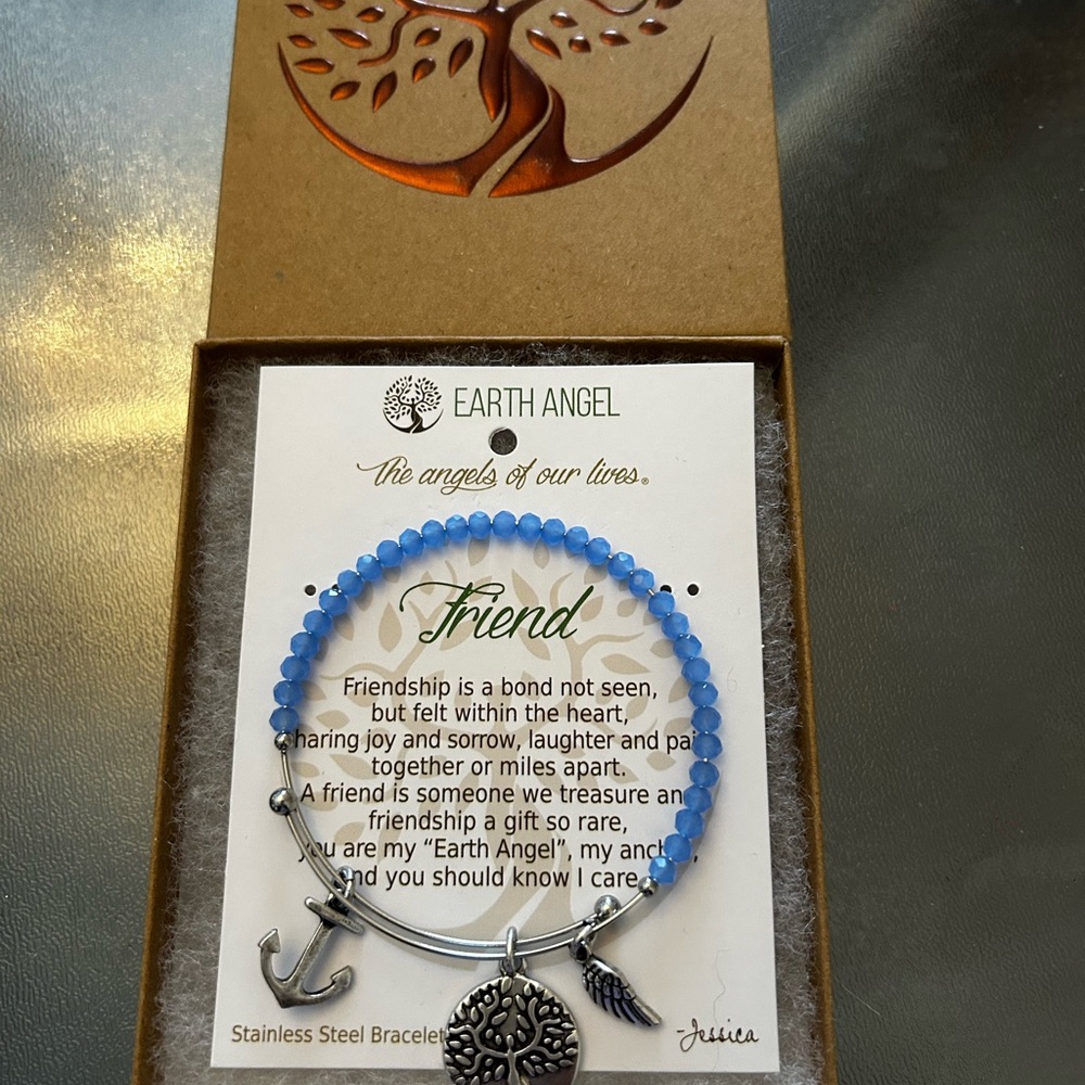 Earth Angel blue beaded and stainless steel friend bracelet with charms. NWOT